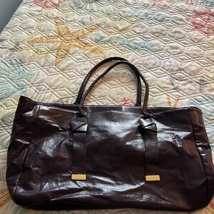 Estée Lauder purple bag